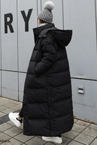 damen-wasserdichte-lange-steppjacke-schwarz