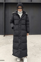 damen-wasserdichte-lange-steppjacke-schwarz